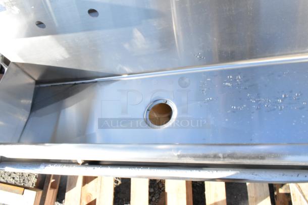 Regency 600HSMS1848 wall-mounted hand sink, 48"x17.5", for two 8" faucets. New scratch and dent condition. Stainless steel.