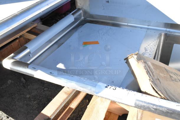 BRAND NEW Regency stainless steel 2 bay sink with left side drain board, slight scratches, model 600S2171718L.