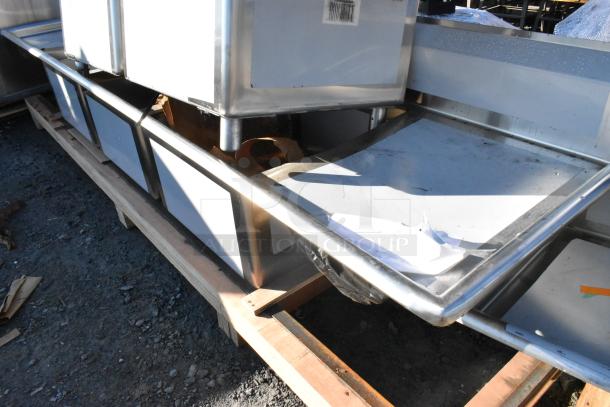 Regency 600S32424224 stainless steel 3 bay sink, brand new with scratches and dents, dual drain boards, no legs.
