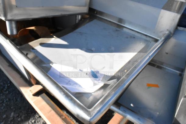 Brand new Regency 600S32424224 3 bay scratch and dent stainless steel sink with dual drain boards, no legs.