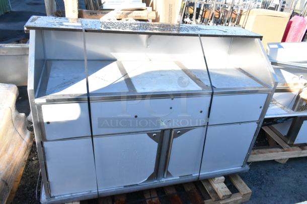 Brand new Regency 600PB63S 63" stainless steel portable bar, includes two removable speed rails, ice bin, and cover. Scratch and dent condition.