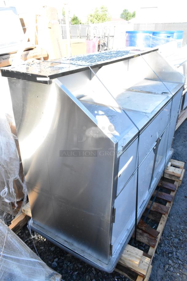 BRAND NEW Regency 600PB63S 63" stainless steel portable bar with removable speed rails, ice bin, and cover, some scratches visible.