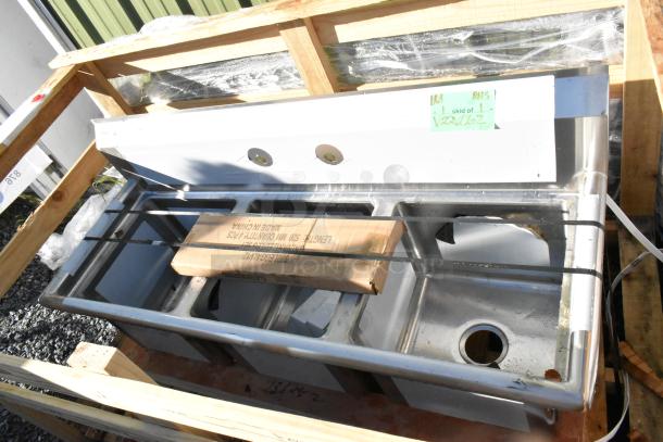 Brand new Regency 54" stainless steel three compartment sink with 15" x 15" x 12" bowls, galvanized legs, and no drainboards.
