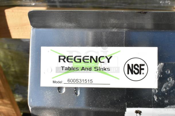 New Regency 54" stainless steel three-compartment sink, model 600S31515, galvanized legs, no drainboards, 15"x15"x12" bowls.