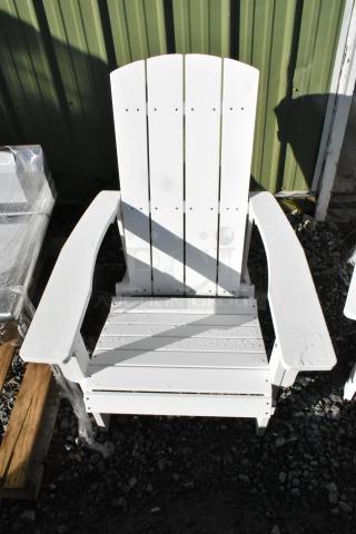 White Adirondack chair, brand new with minor scratches and dents, wooden slat design, outdoor use. Value: double bid.