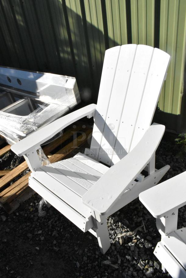 White Adirondack chair, brand new, slight scratch and dent. Classic design, sturdy construction, outdoor use.