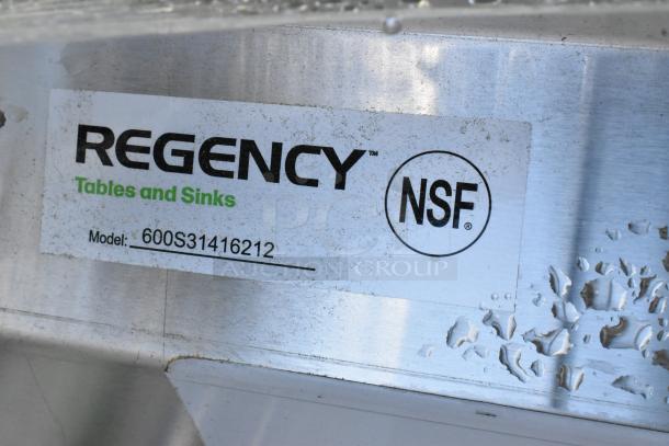 Regency 600S31416212 stainless steel 3 bay sink, NSF certified, brand new with scratches, includes dual drain boards, no legs.