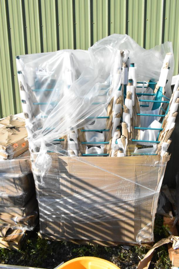 60 Lancaster Table & Seating Alloy Teal Topaz outdoor cafe barstools in original packaging. Scratch and dent condition.