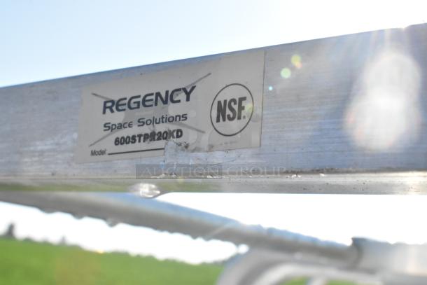 Brand new Regency 600STPR20KD aluminum steam table pan rack. Scratch and dent condition, holds 20 pans. NSF certified.