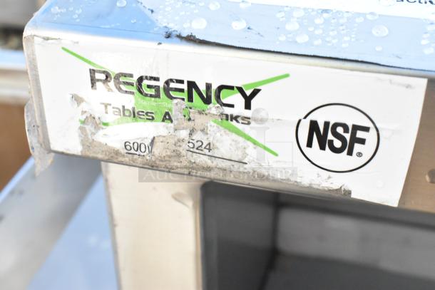 Brand new Regency 600WCH1524, 24" stainless steel wall cabinet, scratch and dent, with hinged doors. NSF certified.