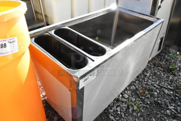 BRAND NEW Regency 600IB1836M 36"x18" stainless steel ice bin with minor scratches, portable, ideal for commercial use.