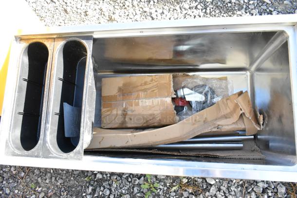 BRAND NEW SCRATCH AND DENT! Regency 600IB1836M 36" x 18" stainless steel portable ice bin, visible packaging wear.