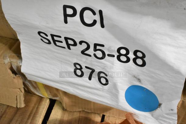 "Scratch and dent" item label showing "PCI SEP25-88 876" with a blue sticker on cardboard packaging.