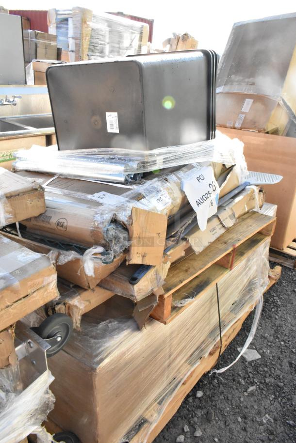 A pallet with brand new scratch and dent items, including wire shelves and trash cans, wrapped in plastic and cardboard. Tags indicate item details.