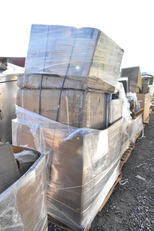 Brand new scratch and dent items, including ice bin and mop sink, wrapped on pallet. Condition: Unused, minor dents.