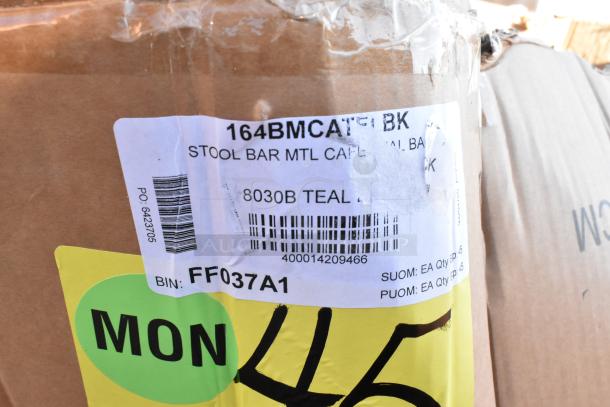 Cardboard box label showing item: Stool Bar MTL CAFE, model 164BMCATF1BK, bin: FF037A1, part of auction lot.