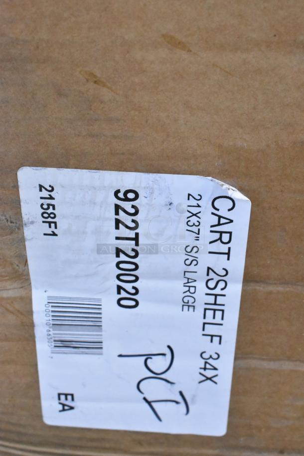 Label on shipping box for stainless steel utility cart, model 922T20020, dimensions 33¾"x21"x37". Appears new.