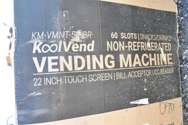 Brand new KoolMore KM-VMNT-50-BR vending machine box. Features 60 slots, snacks/drinks, 22" touch screen, bill acceptor.