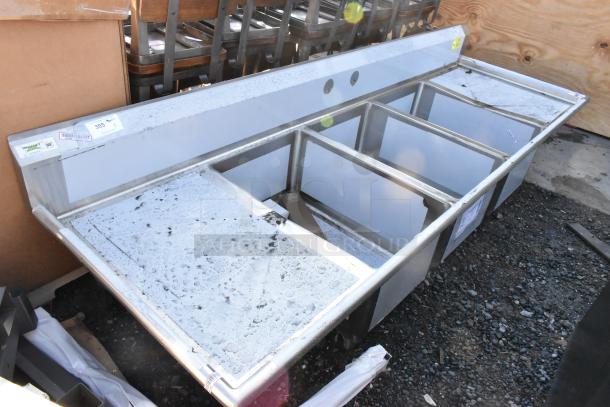 BRAND NEW Regency 600S32030224 stainless steel 3 bay sink with dual drain boards, minor scratches, NSF certified.