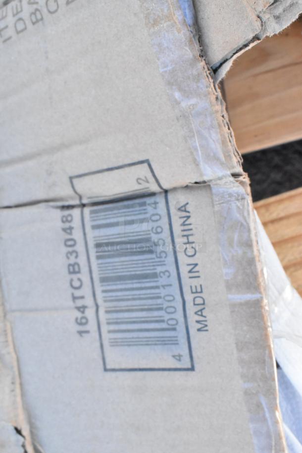 4 brand new scratch and dent items, including Regency 600WS12120HD 12"x120" stainless steel wall shelf, marked as 164TCB3048.