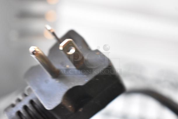 Close-up of the power plug for a 2024 Avantco THD27208 4-slice commercial toaster, 208 volts, 1 phase.