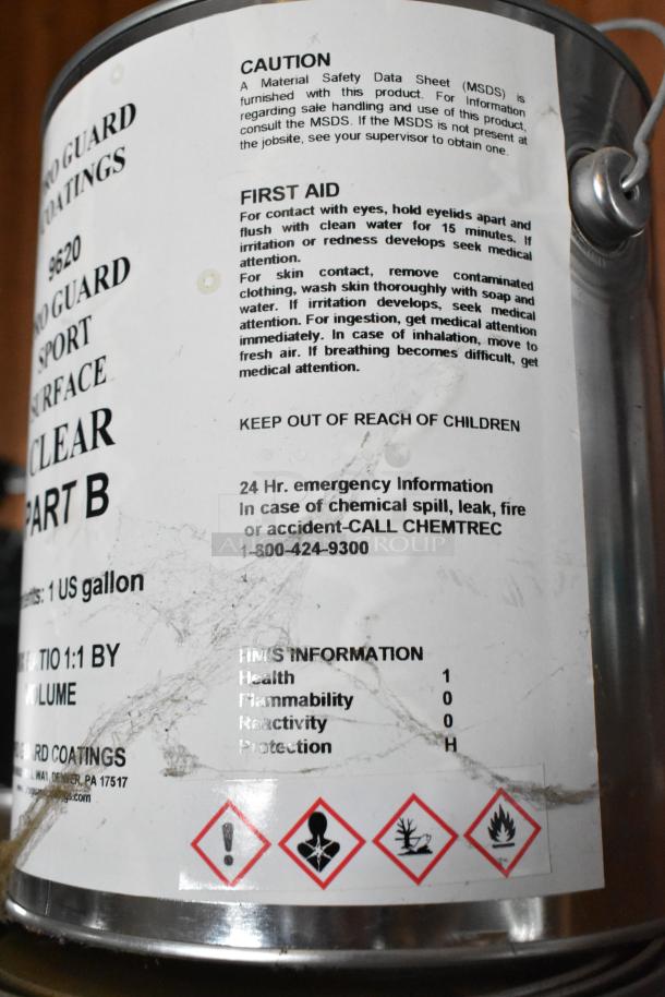 25 Pro Guard chemical cans, featuring 9620 Sport Surface Clear Part B. Labels show safety warnings and precautions.