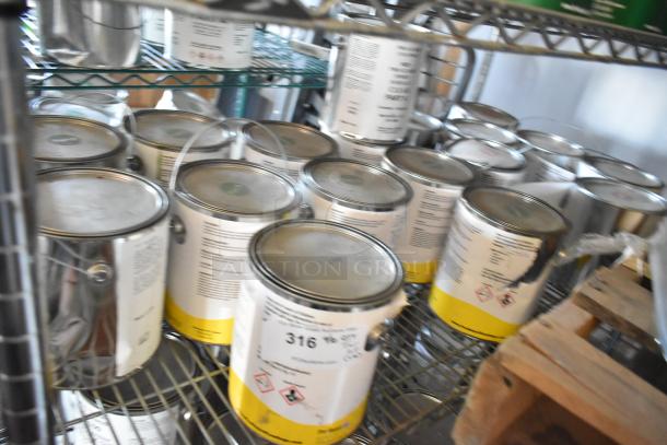 18 cans of Pro Guard chemicals, including 1524 Part B epoxy and 9620 Part A. Labels indicate product details.