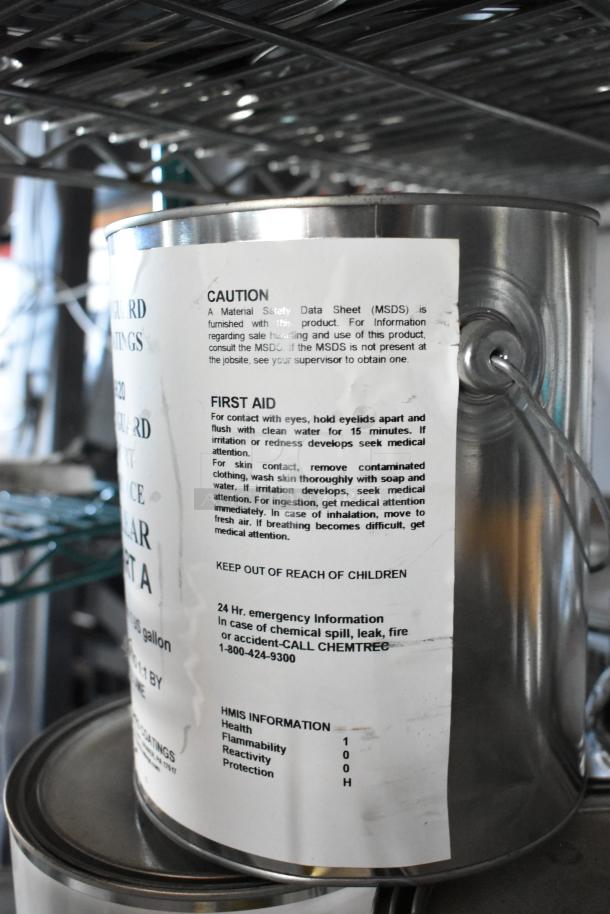 18 Pro Guard chemical cans with visible safety data sheet, including 1524 Part B Clear Blue Epoxy and 9620 Sport Surface Clear Part A.