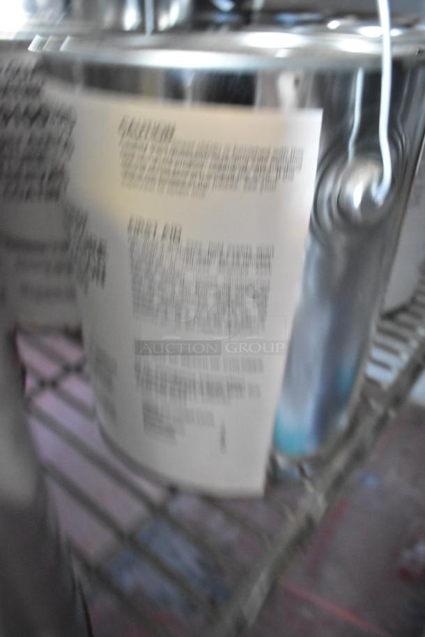 22 Pro Guard chemicals including 9100 Super Armor, 1501 Part A. Some containers have visible caution labels in English.