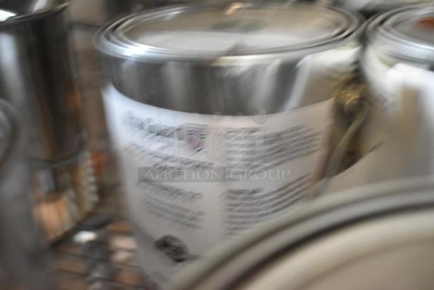 Alt text: "22 cans of Pro Guard Chemicals featuring 9100 Super Armor Moisture Cure. Includes various coatings and Part A."