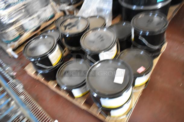 16 black containers of Pro Guard chemicals, including 1524 Part B Clear Blue Proflex Primer, on pallets. Excellent condition.