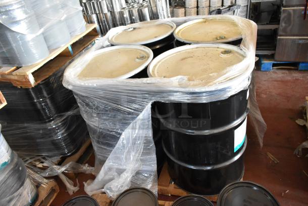 Four 5-gallon drums of Pro Guard Grey 9118 Moisture Cure Liquid Rubber, wrapped on pallets, indicating bulk auction lot.