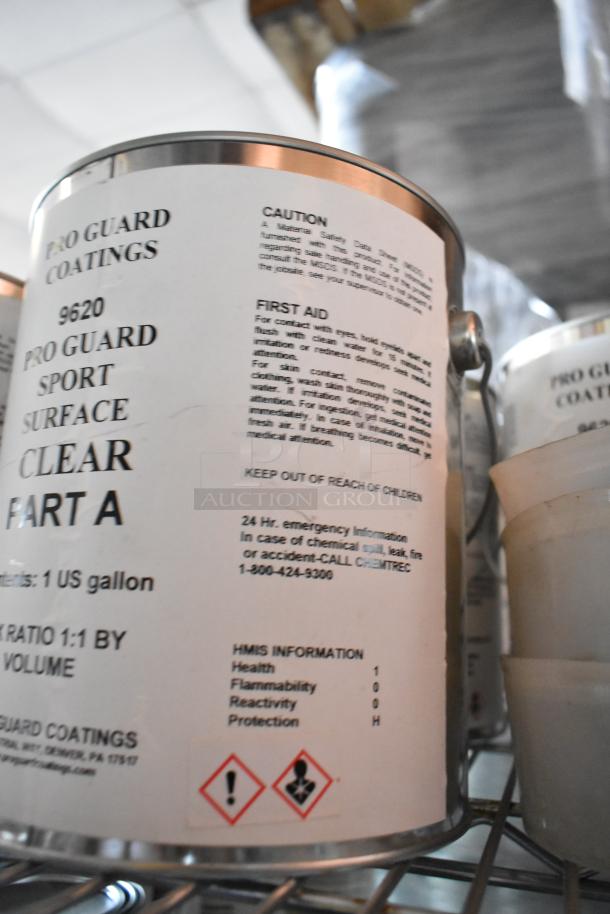 19 Pro Guard chemicals, including 9620 Sport Surface Clear Part A. Labels show safety data, first aid measures, 1-gallon each.