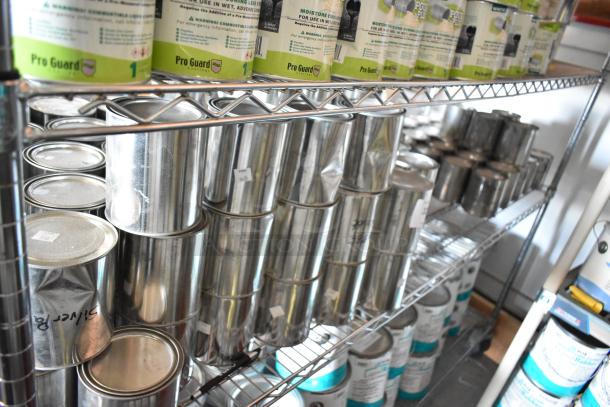 107 Pro Guard Chemical cans, various types and sizes, displayed on metal shelves. Some cans labeled and marked "Gray."