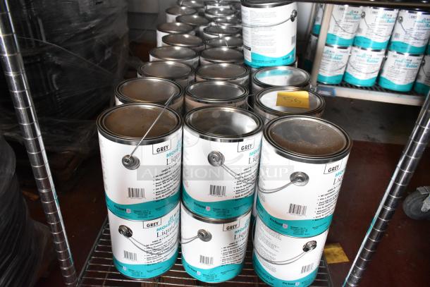 Cans of Pro Guard 9118 Moisture Cure Liquid Rubber stacked on shelves, featuring labels with product details.