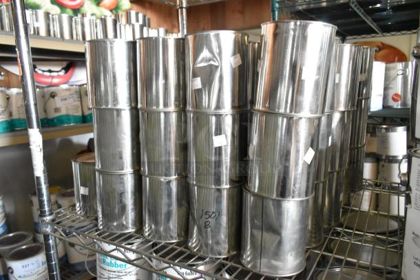 86 Pro Guard chemical cans, including 1501 Part B and 9201K Pour N Plug, on metal shelf; labels indicate contents.