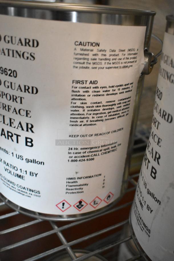 35 Pro Guard chemical cans, including 9620 Sport Surface Clear Part B and 9100 Moisture Cure. Labels show precautions and first aid.