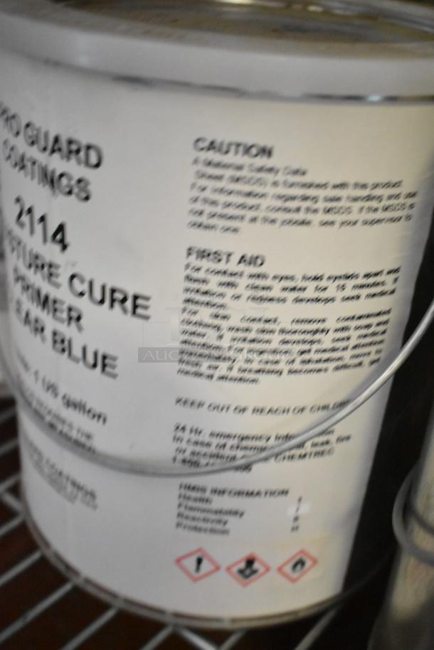 Pro Guard 2114 Moisture Cure Primer Clear Blue, 1-gallon can. Contains caution and first aid instructions. Auction lot of 34 items.