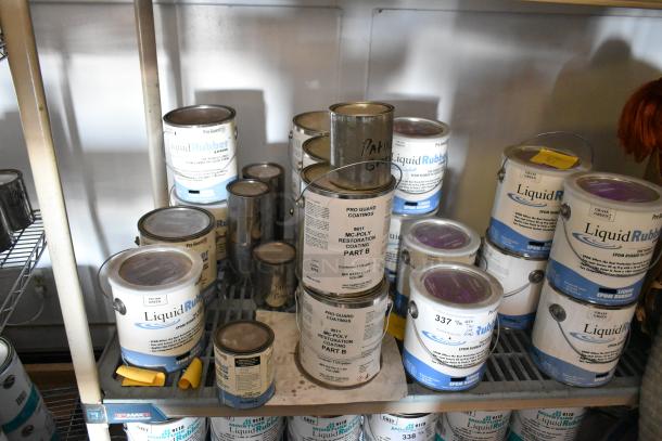 25 Pro Guard chemical cans including MC Poly Restoration Coating Part B and Liquid Rubber Patina Green on shelves.