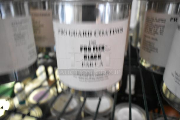 Lot of 41 Pro Guard chemicals, includes Pro Flex Black Part A, labeled cans, ideal for restoration, new condition.