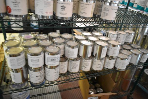 56 Pro Guard chemical cans on metal shelves, including 9100 Super Armor and 2114 Primer. Refillable condition.