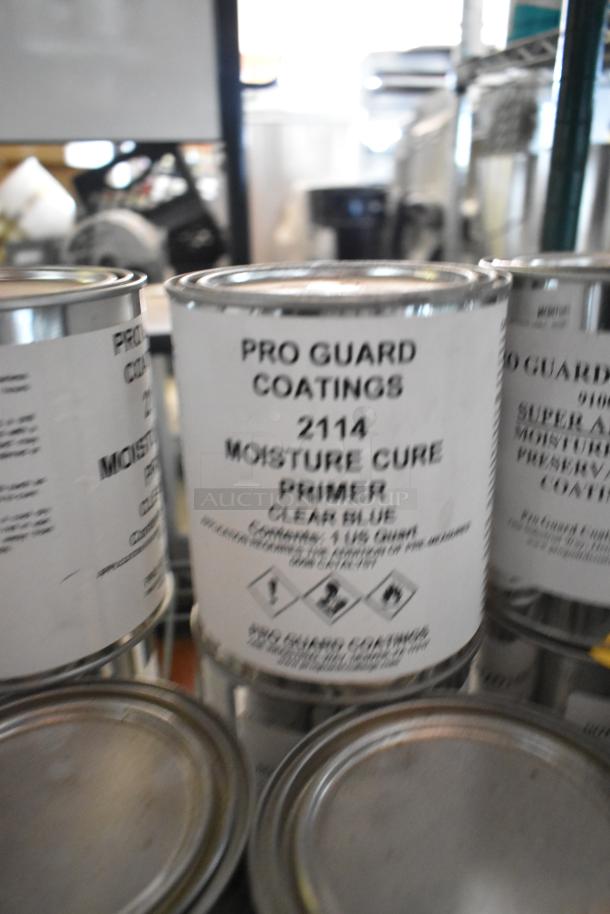 56 Pro Guard chemical cans, including 9100 Super Armor Coating and 2114 Moisture Cure Primer. Clear blue labels.