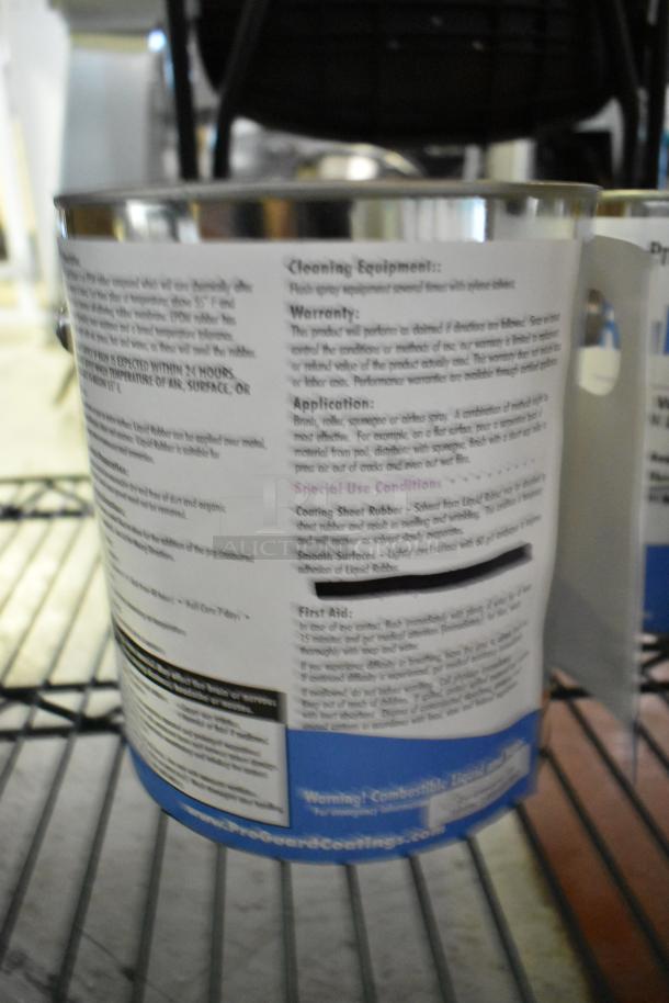 Container of Pro Guard EPDM Gray Liquid Rubber, visible application and warning text, on a shelf in a workshop setting.
