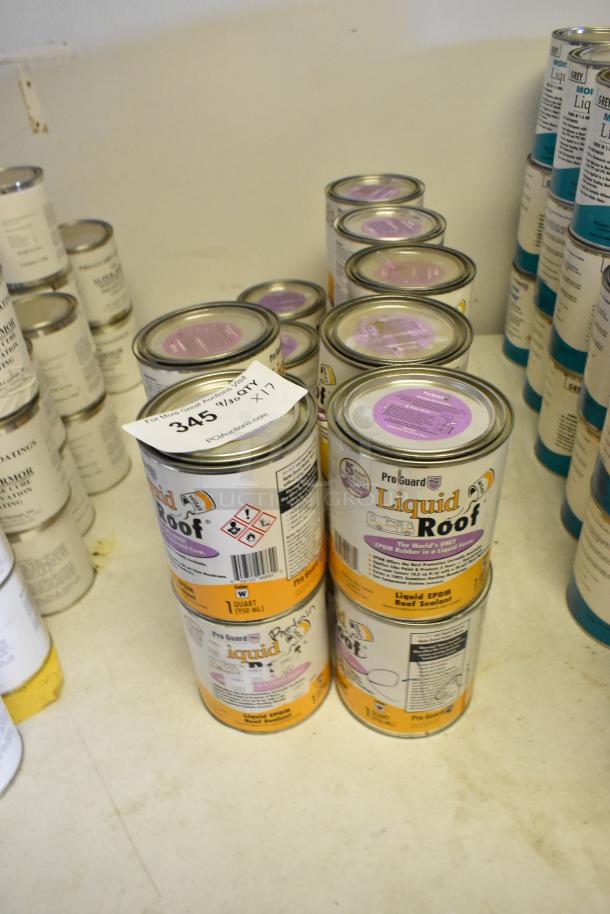 17 cans of Pro Guard Liquid Roof EPDM sealant; labeled one-quart size; new condition; auction lot number visible.