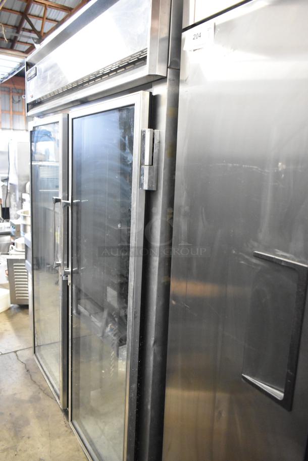 Continental 2RE-GD metal commercial 2-door reach-in cooler merchandiser on casters, 115 volts, 1 phase, glass doors.