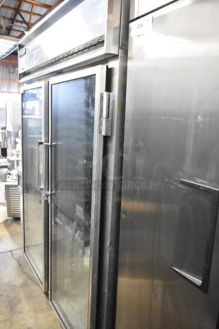 Continental 2RE-GD metal commercial 2-door reach-in cooler merchandiser on casters, 115 volts, 1 phase, glass doors.