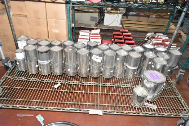 56 various Pro Guard chemicals, including ProFlex 1501 Part B epoxy, in metal cans on a shelf. Auction lot.