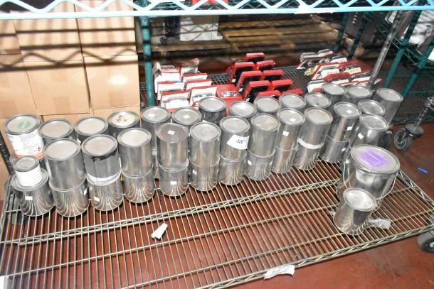 56 Pro Guard chemical cans, including ProFlex 1501 Part B epoxy, on a metal shelf. Condition: Sealed, labeled for auction.