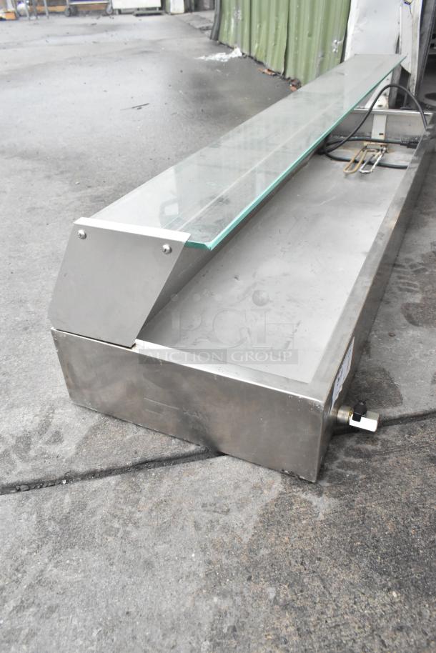 Brand new Avantco food warmer with sneeze guard; stainless steel, visible scratches, dented corners, glass top.