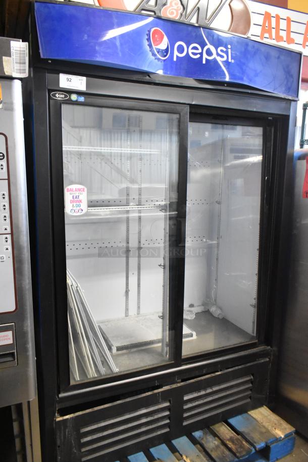 QBD CD45-HC commercial cooler, 2-door reach-in, poly-coated racks, Pepsi branding, 115V, 1 phase, good condition.